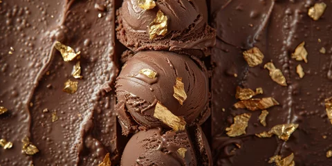 Deurstickers Close up of decadent chocolate ice cream with shimmering gold flakes on the side of the bar © SHOTPRIME STUDIO