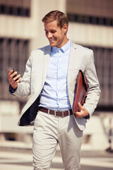 Smile, phone and businessman in city with bag for travel, commute or reading email outdoor. Mobile,...