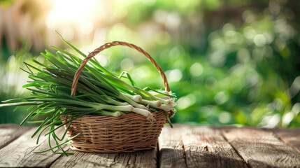 a basket full of green onions on an old wooden table with a farm background - Powered by Adobe