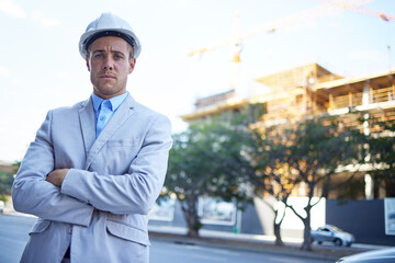 Architecture, arms crossed and portrait with business man outdoor on building site for project...