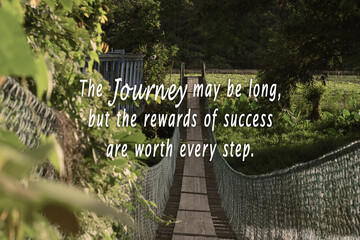 Hanging bridge with motivational quote about journey to success.