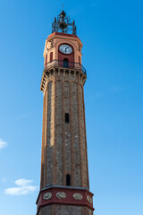 Barcelona, Spain: Torre del Rellotge, Plaça de la Vila de Gràcia - obrazy, fototapety, plakaty