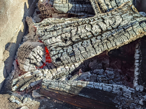 charcoal from burnt firewood in the barbecue