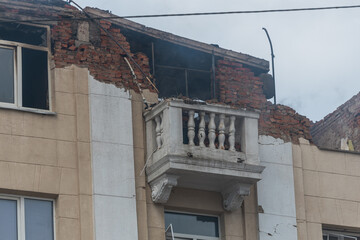 Fototapeta na wymiar A Russian missile hit a residential building in the city of Dnepr, Ukraine. Damaged apartment building after a massive missile attack on 04/19/24. Scars of war. Consequences of the attack