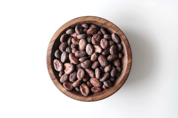 Fototapeta premium A wooden bowl filled with nuts on a white table. Suitable for food and nutrition concepts
