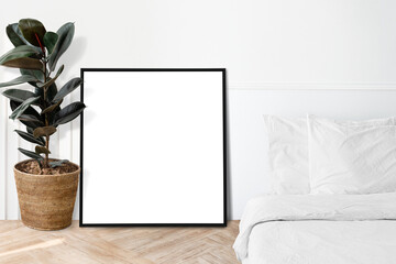 Blank picture frame in a bedroom
