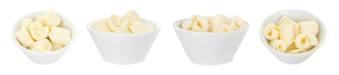 Set with swirls of butter in bowl isolated on white, views from different sides