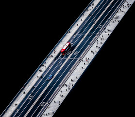 aerial view of London bridge with red double decker bus	
