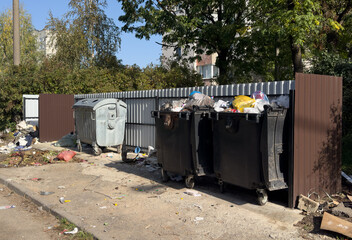 Dumpster for Garbage. Litter, food waste on city street. Full Dumpster and Overflowing trash....
