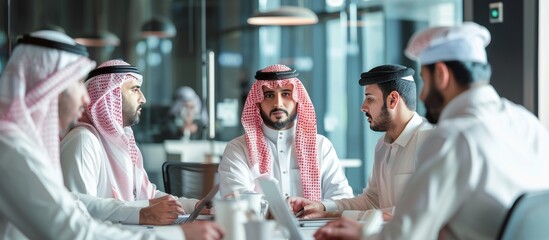 arab businessmen meeting in the office - obrazy, fototapety, plakaty