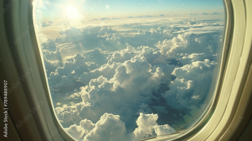 Aufkleber a scenic view of clouds from an airplane window. perfect for travel blogs or aviation websites