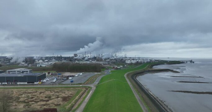Revealing aerial drone view on the chemical park of Terneuzen, The Netherlands. Production of mainly plastics. Industrial facility.