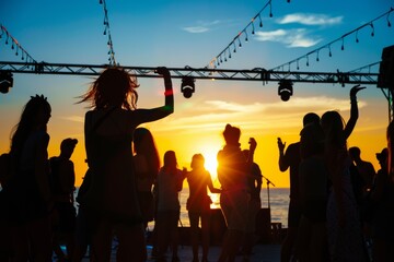 Silhouettes sway in a vibrant sunset at a tropical beach dance party, epitomizing summer joy.