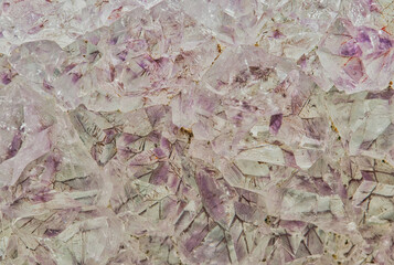 Purple amethyst geode inside, raw quartz crystals mineral precious gemstones.