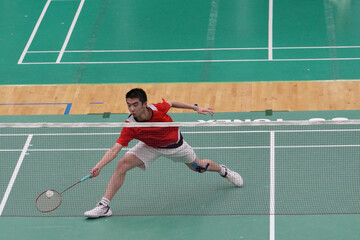 A very focused player who plays single badminton