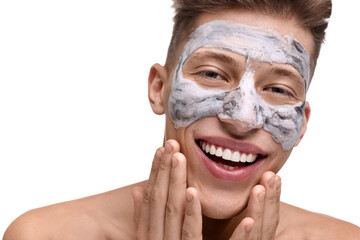 Handsome man with clay mask on his face against white background, closeup