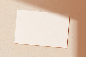 PNG blank card mockup on a beige concrete