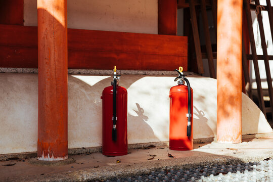Safety First: Fire Extinguishers at Traditional Shrine