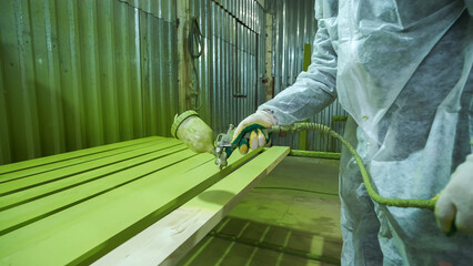 painting wood in production, spray booth