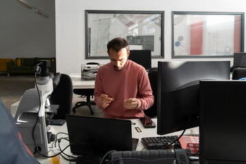  scientist researcher working on biotech laboratory office