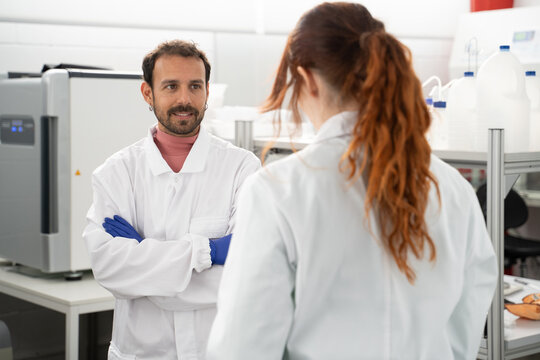 scientists working in biotech laboratory