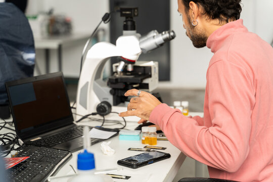  scientist researcher working on biotech laboratory