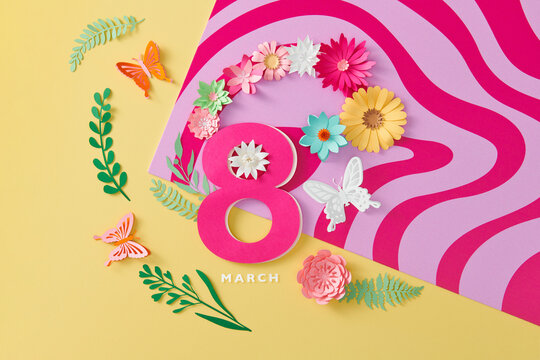 Happy Women's Day. Creative layout. Paper art flowers and digit eight