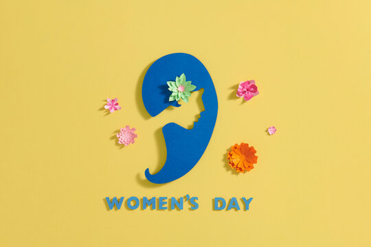 International Women's Day March 8 greeting card with woman face