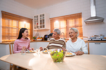 Capture the Joy of Family: Happy Grandparents Enjoying Retirement Indoors, Hugging Their Children...