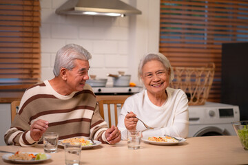 Asian Family Happiness in the Kitchen: Senior Parents Cooking Dinner with Joy, Children Laughing, A Fun and Loving Atmosphere of Togetherness, Creating Delicious Meals and Beautiful Memories