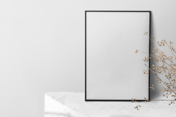 Picture frame mockup png leaning against the wall with house plant