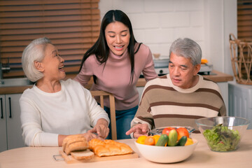 Asian Family Happiness in the Kitchen: Senior Parents Cooking Dinner with Joy, Children Laughing, A Fun and Loving Atmosphere of Togetherness, Creating Delicious Meals and Beautiful Memories