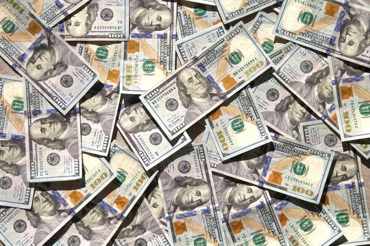 Pile of hundred dollar bills