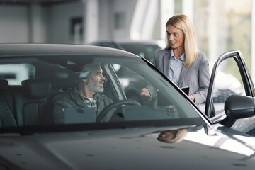 Professional car store worker presentation vehicle official shop