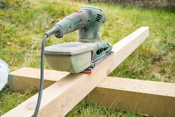 Electric Wood Planer hand held Green Machine. Planer close-up. Carpentry, 