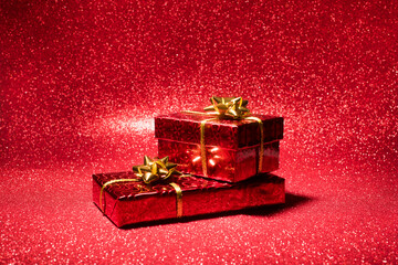Valentine's day shiny gifts on glitter surface