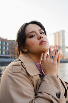 Fashion model looking at the camera with certainty.