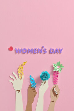 Set of female hands holding beautiful flowers for happy woman's day