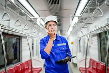 The Engineer Checks The Condition Of Electric Train at railway track.