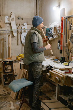 guitar master tuning the instrument