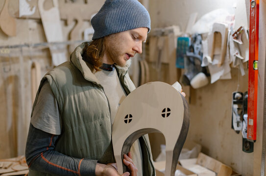 guitar master tuning the instrument