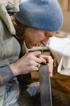 guitar master tuning the instrument