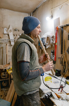 guitar master tuning the instrument