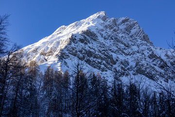Scenic view on snow capped mountain peak of Mittagskogel (Kepa) in Karawanks, Carinthia, Austria,...