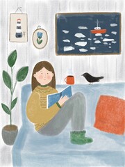 girl with a book on the sofa