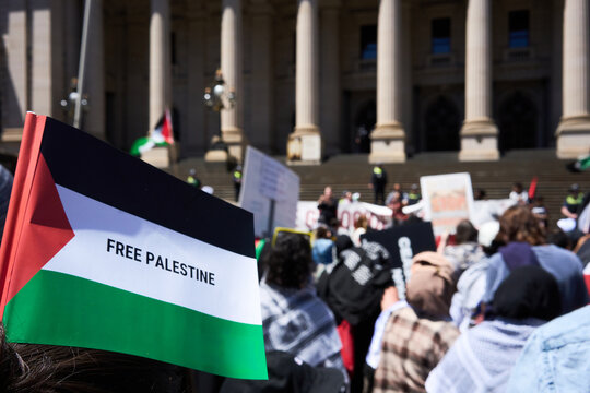 Flag at protest with 'Free Palestine'