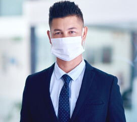 Business, portrait and man in office with face mask for health, wellness and covid compliance....