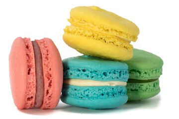 extreme macro closeup of colorful macaroon or meringue cookies on a white background