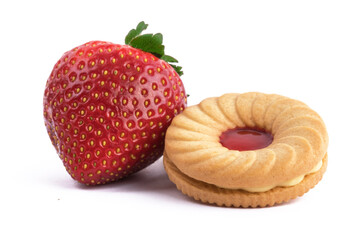 close up a strawberry jam cookie and a large red strawberry isolated on white