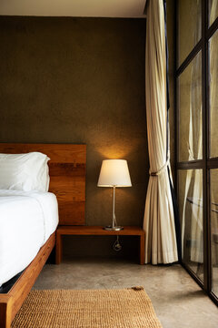 A lamp on a bedside table.